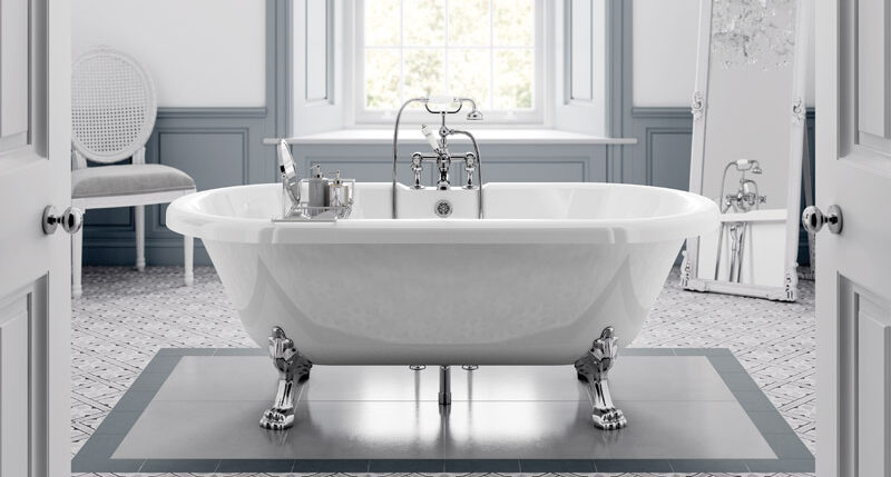 Uppingham twin skin claw feet bath with silver feet, in a white and silver luxurious bathroom, with a chandelier above